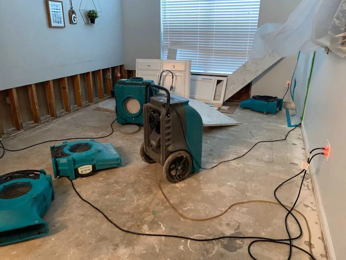 Dehumidifier in flood-cut room for Water Damage Restoration in Scranton